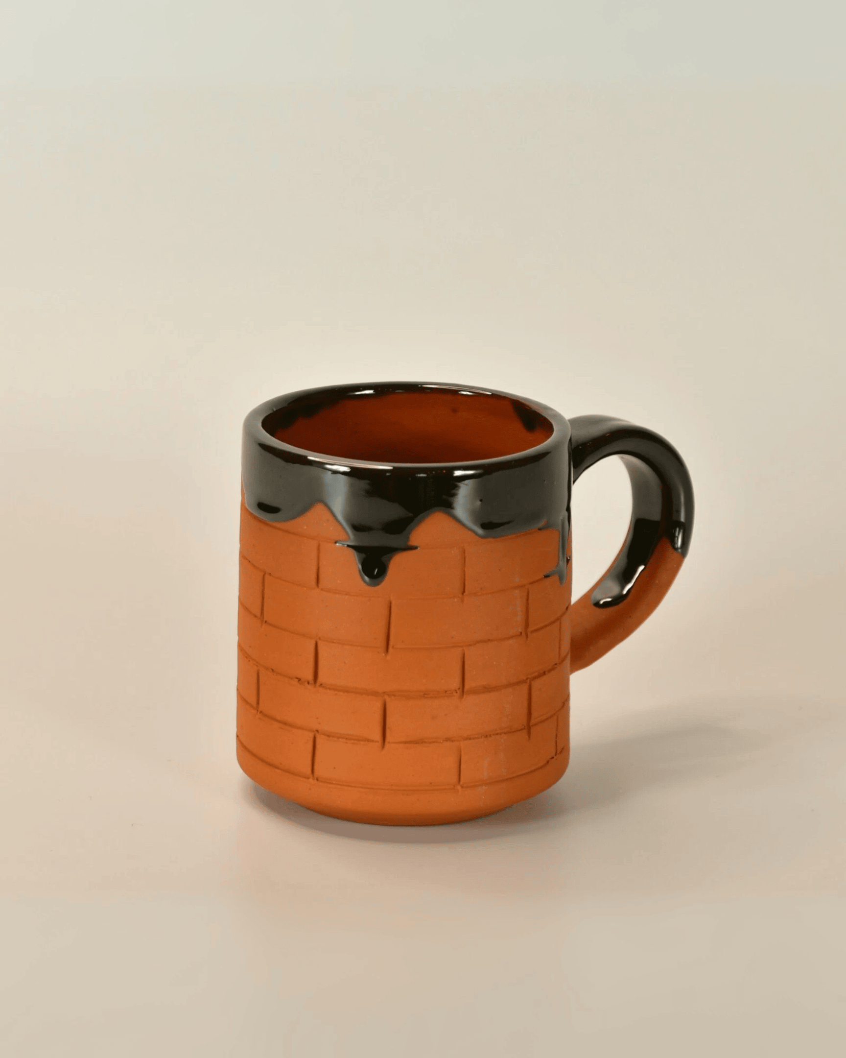 Rustic Brick Texture with Gloss Black Drip Glaze Terracotta Mug